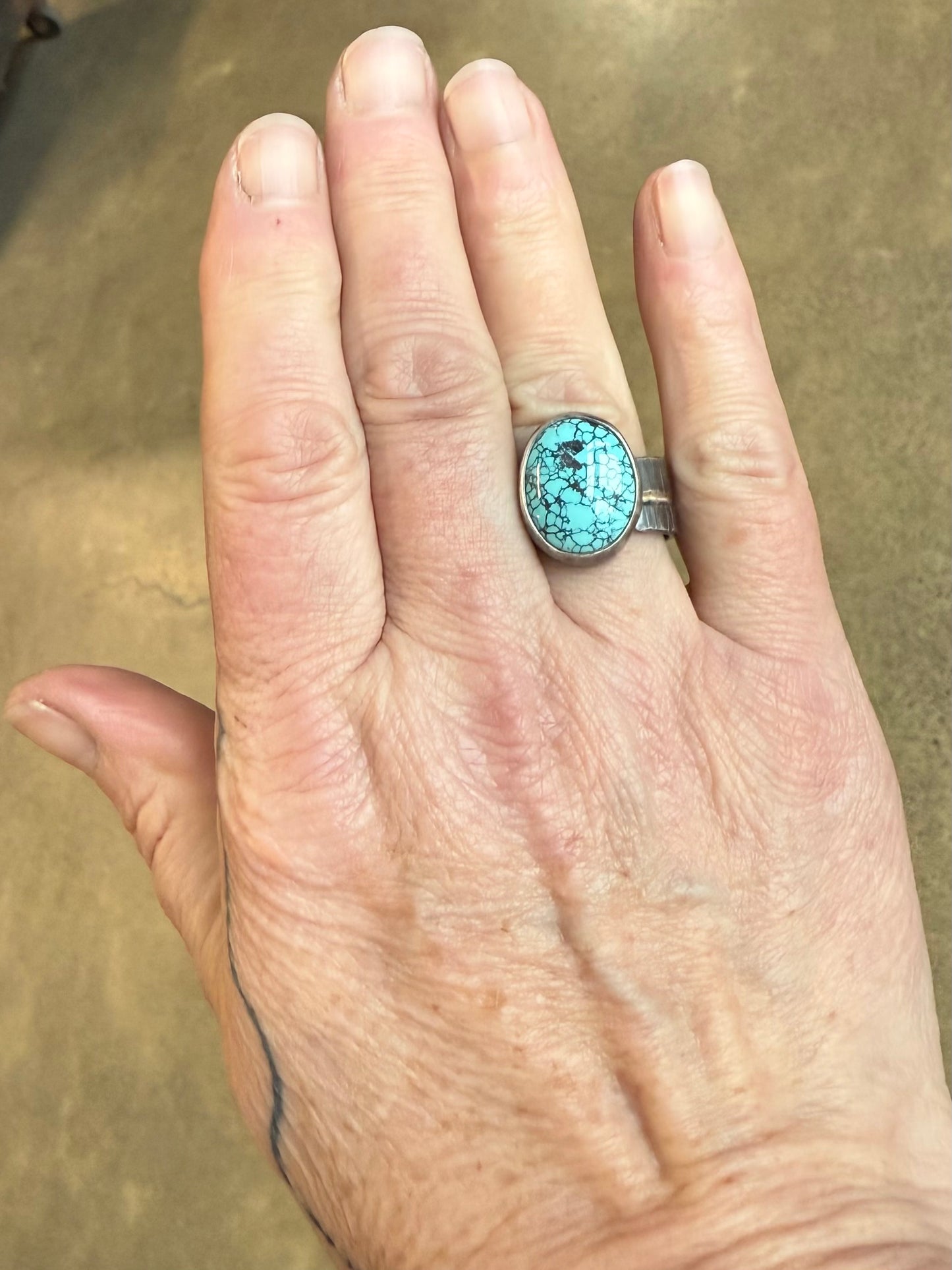 Handmade turquoise statement ring with oxidized sterling silver wide band