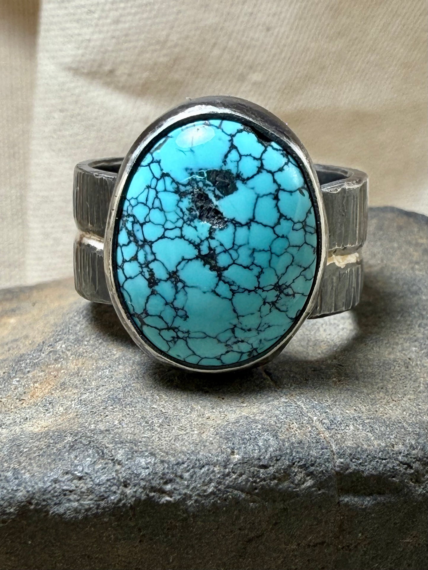 Handmade turquoise statement ring with oxidized sterling silver wide band